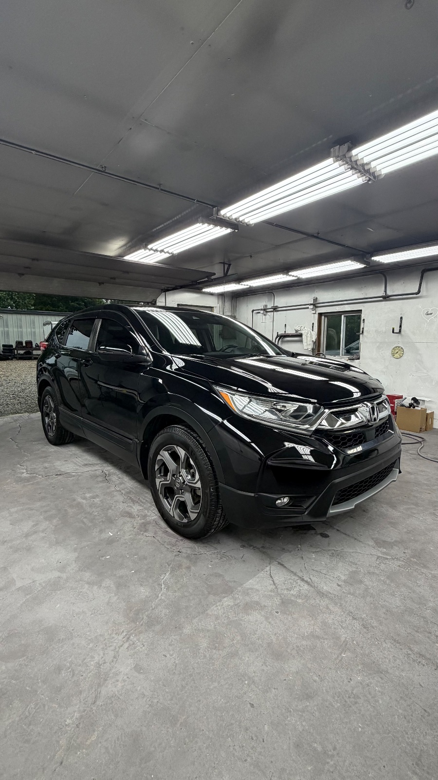 Mobile detailing setup in customer driveway