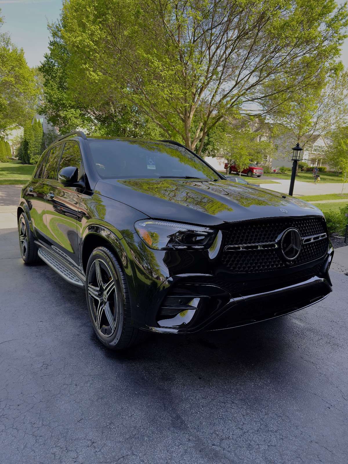 Freshly detailed car exterior with deep gloss finish
